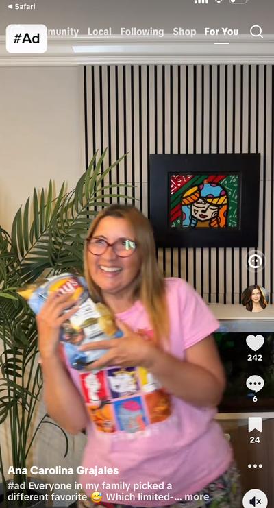 Ana’s mom holding a variety pack of Lay’s chips