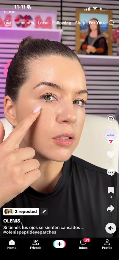 Ana applying Olenis eye patches