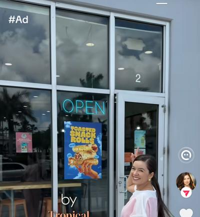 Ana outside Tropical Smoothie Cafe in pink outfit