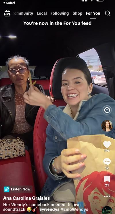 Ana and her mom in car with Wendy's bag